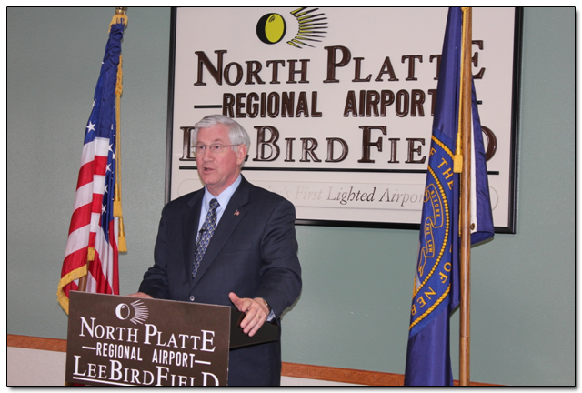 State Treasurer Don Stenberg speaking to reporters at the North Platte Regional Airport.